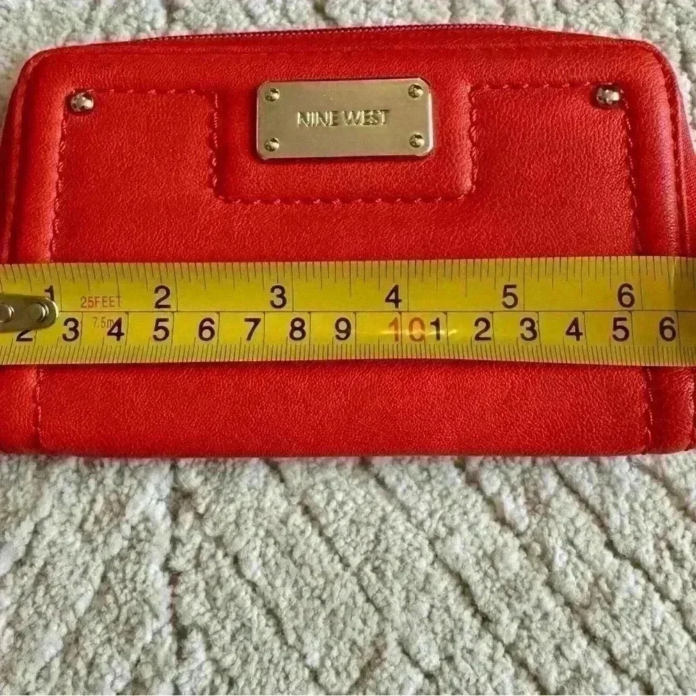 None west burnt orange zip around wallet
